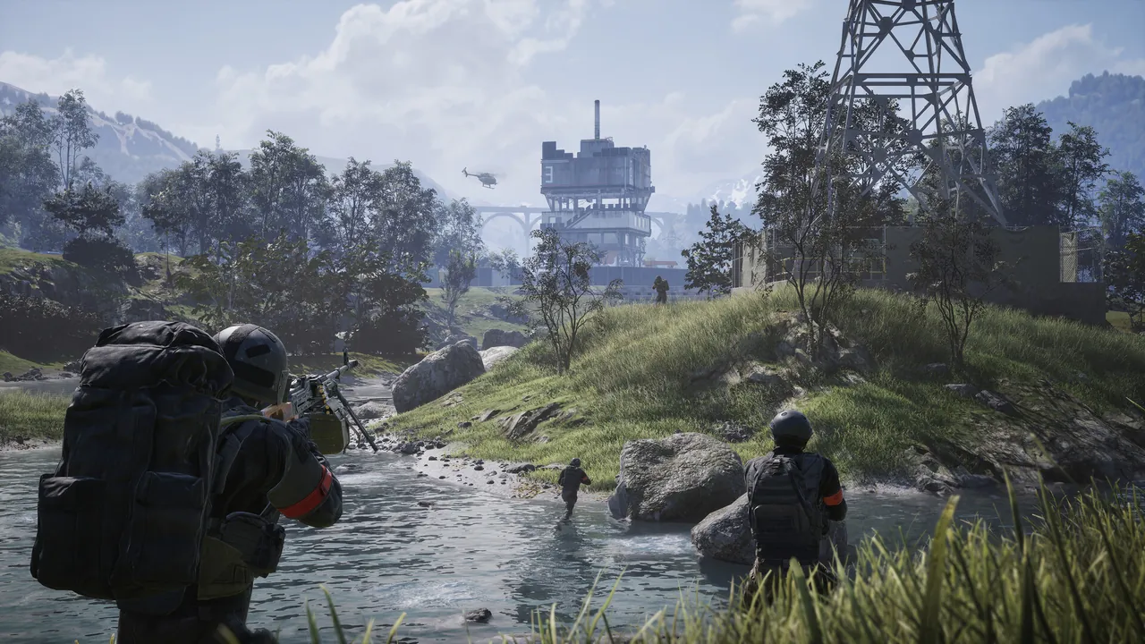 Soldiers wading across a shallow river toward a tall concrete tower on a hill, with a helicopter flying near it.